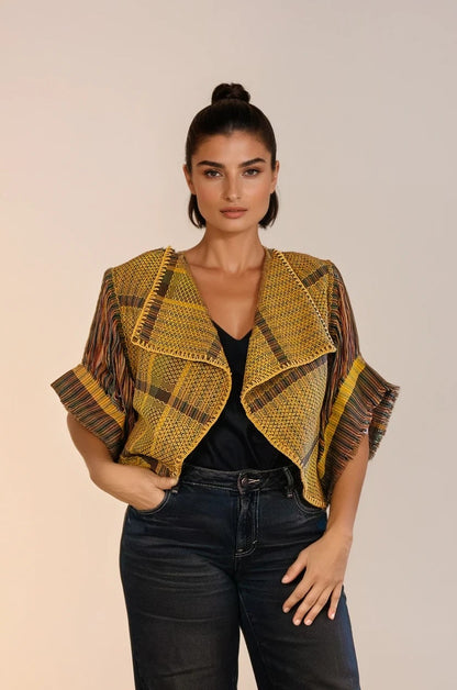 Torera elaborada con textil 100% artesanal, tejido en telar de pedal tradicional. Diseño original de Nativa de Corazón, pieza única.